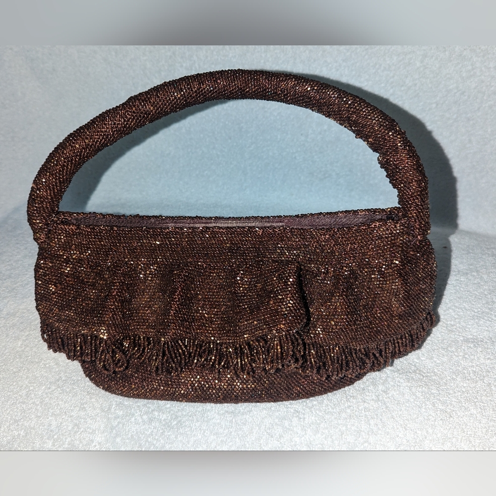 Vintage copper tone beaded handbag.